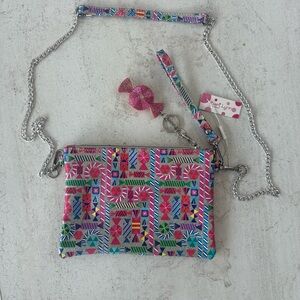 Super fun sparkly and bright colored crossbody girl’s bag